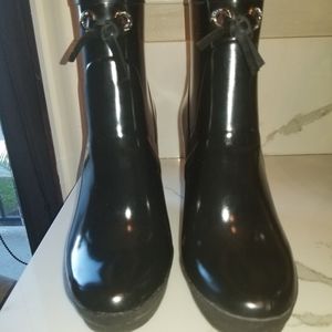 Coach rain booties.